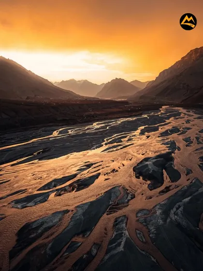 The braided rivers of Spiti Valley at sunset create a golden, otherworldly landscape. This is the ultimate solution for happiness I promise to show you.