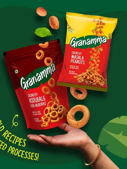 A composite shot for Granamma snacks, showing two different products floating above a hand. This style of photography is great for digital marketing, creating a magical and enticing visual that highlights variety.