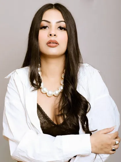 A striking model portrait that focuses on attitude and style. This type of headshot is ideal for an influencer's portfolio or a brand's social media content.