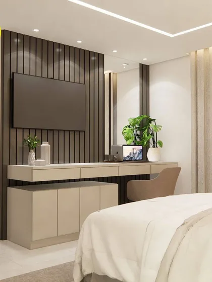 This view shows the TV unit from the bed, demonstrating the thoughtful layout and design of the space.