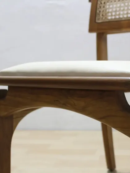 The structural detail under the seat of this custom chair. Good design is not just about what you see, but also about the strength and stability of the construction.