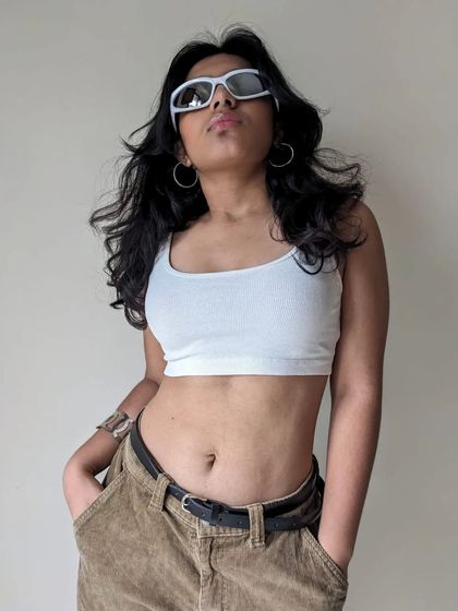 Another BTS shot from the "Phoenix" photoshoot. I love this confident pose and the simple, clean background that makes the style pop.