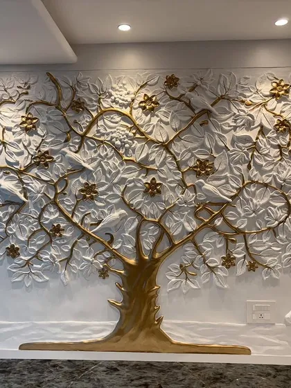 I designed this Kalpavriksha tree as a symbol of prosperity and creativity for a main office room. It's a custom 3D fibre mural with gold and white detailing, creating an incredible backdrop for the company's leader.