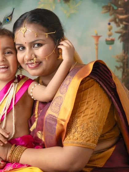 The bright, happy smile of little Krishna is the centerpiece of this portrait. I work to make children feel comfortable so their true personalities can shine through.