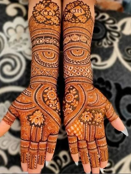 A personalized design with initials and intricate patterns.