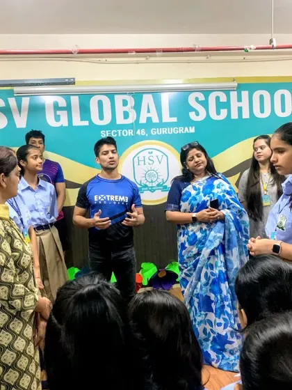 Discussing important safety concepts with students and teachers. It's crucial to have these conversations to build a safer community for everyone.
