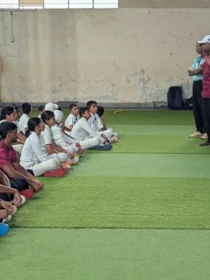 Interacting with the players from the side, ensuring every player feels seen and heard during our group sessions.