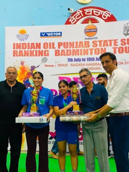**Punjab State Silver Medalist.** Arushie Mehta on the podium after securing a silver medal in the Girls' Doubles U-17 category at the Punjab State Sub-Junior Ranking Tournament.
