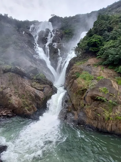 The powerful lower cascade of Dudhsagar Falls, a must-see on our weekend treks from Bangalore.
