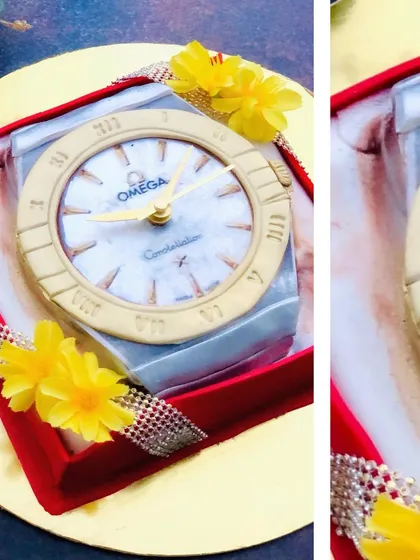 Another angle of the Omega watch cake, highlighting its 3D form and realistic finish.