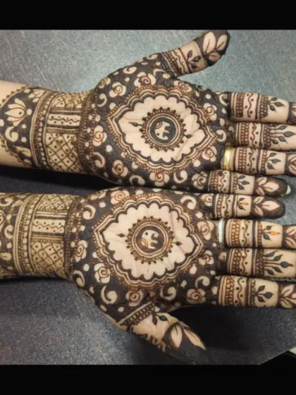 A full view of a gorgeous design featuring elephant motifs within a central mandala. This is a popular choice for its traditional symbolism and beauty.