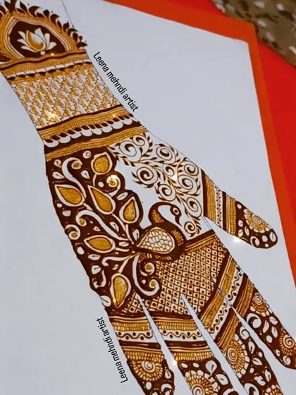 A practice design featuring a peacock and swirling paisley patterns.