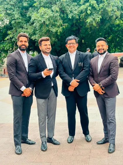 A happy moment with my team. We believe that a positive attitude is part of the path to success.