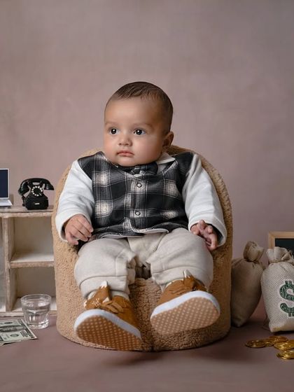 "I may be small, but I'm the boss." This hilarious and adorable 'Boss Baby' themed shoot perfectly captures a little one with a big personality.