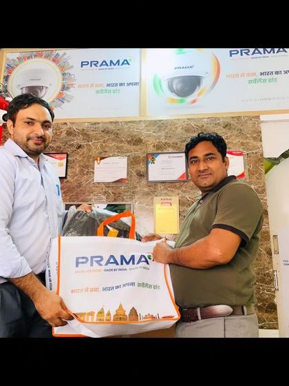 As an authorized distributor for Prama in Gurugram, I am able to provide their full range of 'Made in India' security products. Here I am with a happy partner at my store.