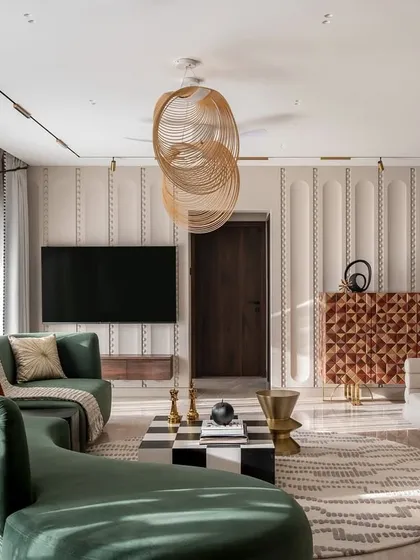 A wide shot of the Evelyn living room, showcasing the expansive feel of the space. The arrangement of the furniture encourages conversation, while the large windows connect the interior to the city outside.