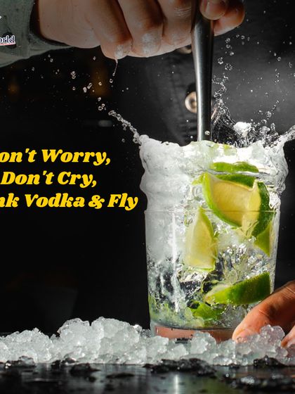 A dynamic shot of a bartender muddling lime and mint with a splash. This captures the energy and fresh ingredients that go into making a classic mojito.