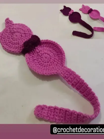 A cute cat-shaped bookmark to hold your place in your favorite book. The long tail slips between the pages, while the cat's head peeks out from the top.