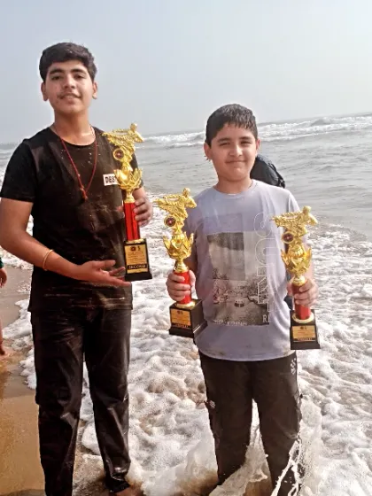 Two of my students with their trophies at Marina Beach the day after the tournament. A well-deserved celebration.