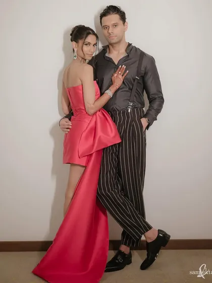 A stylish portrait of Saumya and Sid in their after-party outfits. Their confident poses and chic attire capture the cool, modern vibe of their celebration.