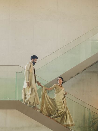 An architectural shot from a housewarming event. This shows how a timeless makeup look fits perfectly into any setting, ensuring you look elegant and poised throughout your special day.