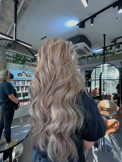 A final shot of this stunning long ash blonde look, a testament to careful technique and quality products.
