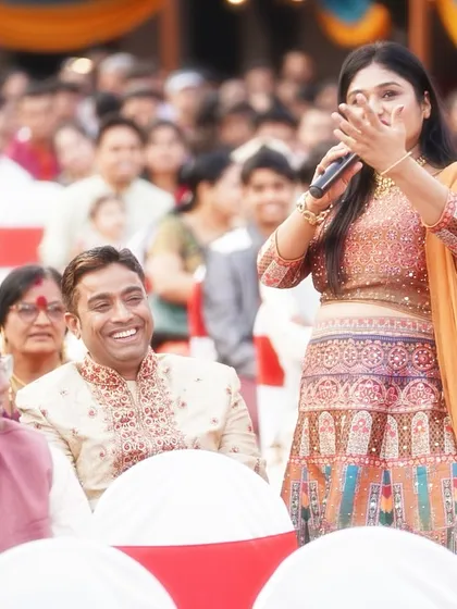 A candid moment of laughter and connection with the audience. Their energy fuels my performance.