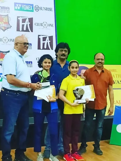 Aditi Yadav and her partner receiving the runner-up trophy at the Maharashtra State Mini State Championship 2023 in Virar.