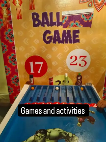 This tabletop ball game is another great option for some friendly competition. It's a simple yet engaging activity that can keep guests entertained throughout the party.
