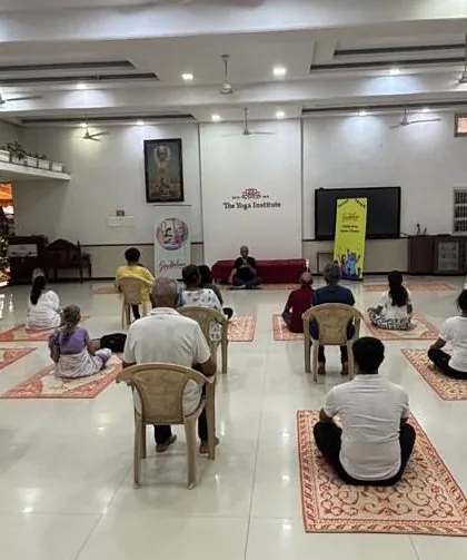 A view of our hall during the special session for senior citizens. We believe in creating a safe and supportive environment where everyone can practice Yoga at their own pace, using chairs for support if needed.