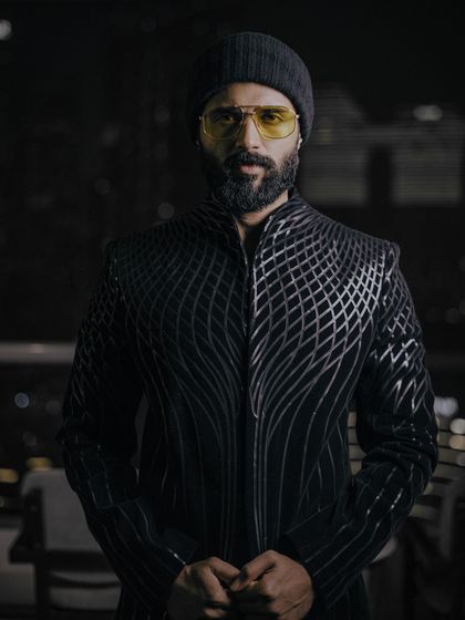For this look, I styled Vijay Deverakonda in a futuristic bandhgala by Amit Aggarwal. The metallic, structured detailing and yellow-tinted glasses create an edgy, high-fashion statement.