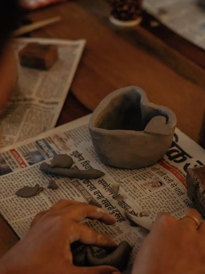 A snapshot from our 'A Much Kneaded Connection' collaborative workshop with Leo's Pizzeria. Participants enjoyed a session of hand-building pottery, creating heart-shaped bowls.