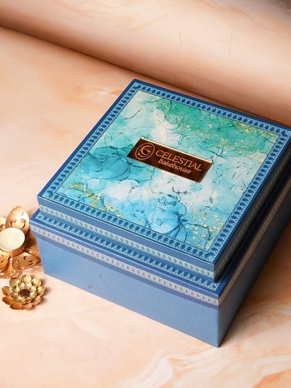 The exterior of our beautiful celestial blue gift box, part of our Rakshabandhan Edit. We believe the packaging is the first part of the gift, designed to create a sense of anticipation and delight.