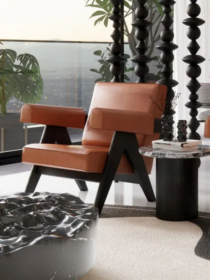 Detail is paramount in our work. In the Renaissance Bellevue penthouse, we curated every element, from the iconic Pierre Jeanneret-style armchair to the textures of the marble and rug, to create a refined and sophisticated urban retreat.