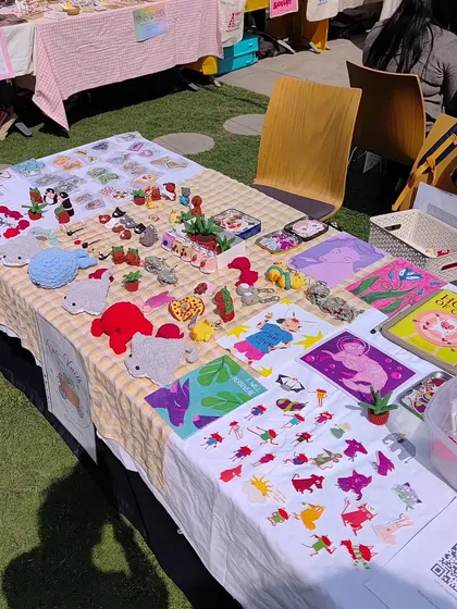 Another angle of my stall setup. You can see my crochet work alongside some of my art prints.
