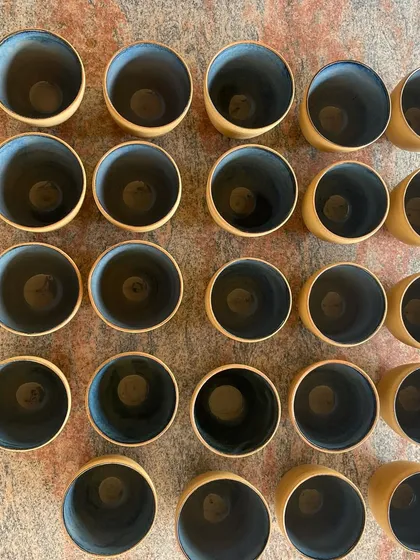 I love the beautiful imperfections that can happen during firing. This batch of stoneware cups and plates came out with a stunning, deep blue glaze that has so much character.