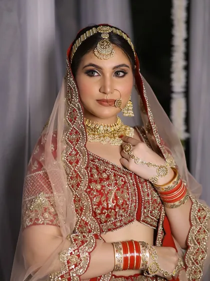 A full view of the Nikah bride, highlighting the graceful fall of her veil and the way her makeup brings the whole look together with sophistication.