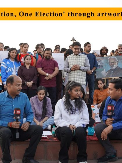 Our students being interviewed by News18 during the 'One Nation, One Election' art event.