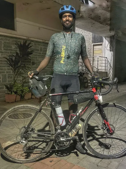 A finisher of the Jog Falls 1000K BRM, exhausted but proud. This image captures the raw emotion of completing a 1000km ultra-endurance event.