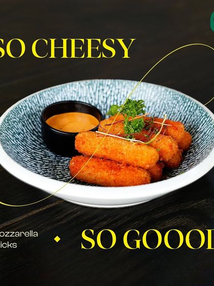 So cheesy, so good. Our golden-fried mozzarella sticks are served with a tangy dip, making for an irresistible appetizer.