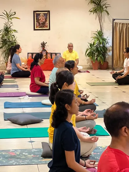A class of TTC graduates practicing meditation together. The experience of practicing with a group of trained teachers is mature and deeply profound.