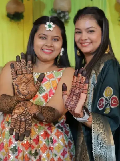 The bride and her sister showing off their matching mehndi. I love creating coordinated designs for the bridal party to make everyone feel included in the celebration.