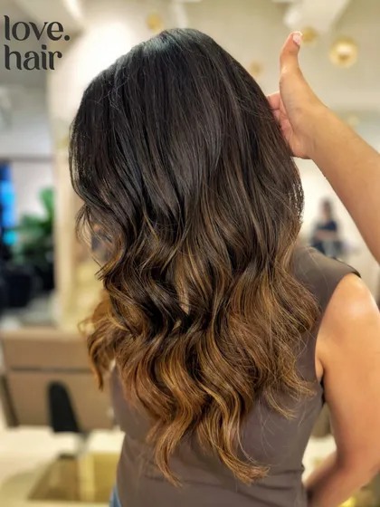 This is what we call quiet luxury. A gorgeous, subtle brown balayage created without bleach for a sophisticated and low-maintenance look that grows out beautifully.