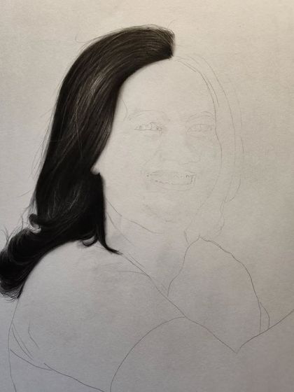 The very beginning of the portrait, focusing on the hair.