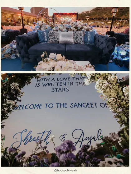 A celestial-themed Sangeet welcome sign and a plush blue velvet lounge area, setting the stage for an evening "written in the stars."