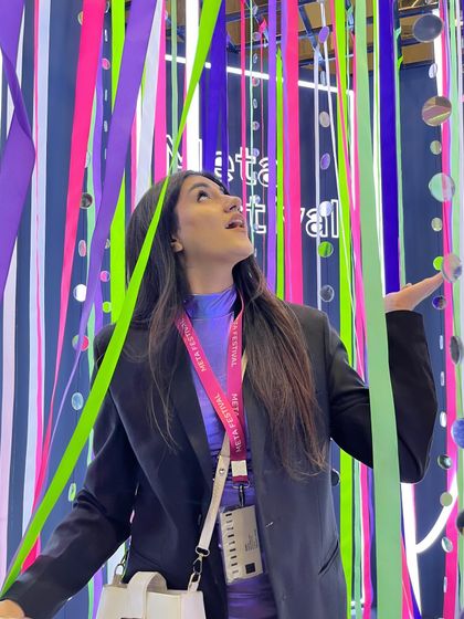 Having fun in a colorful, interactive installation at the Meta Festival.