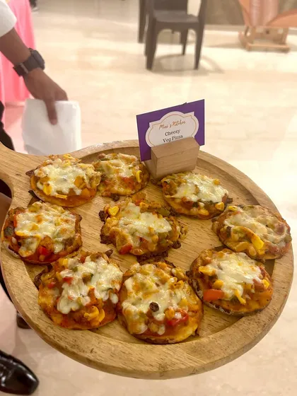My Cheesy Tri Pizzas are the ultimate party starter. Served fresh and hot on wooden platters by my professional staff, these bite-sized treats are always a crowd-pleaser. They are perfect as a pass-around appetizer for any celebration.