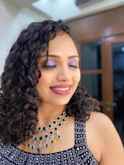 Another look at her stunning makeup and hair. We believe in enhancing natural beauty.