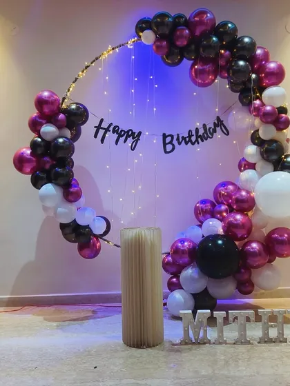 Another view of the elegant ring decor at home, showing the personalized marquee letters for 'MITHU'. We can add custom names to any setup.