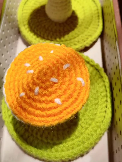A top-down view of the yellow mushroom holder.